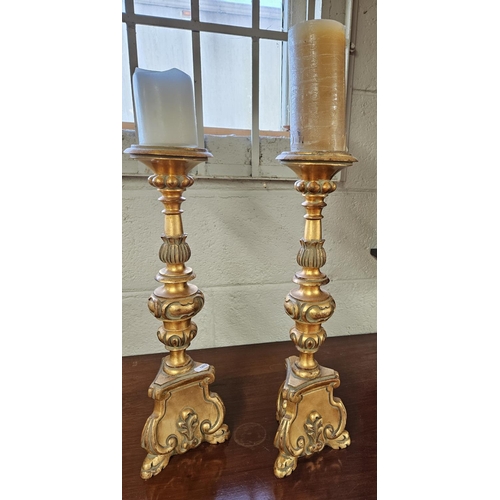 149 - A good pair of Gilt pricket Stands.