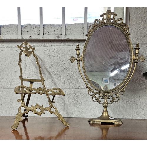 174 - A Brass Easel along with an oval vanity Mirror.