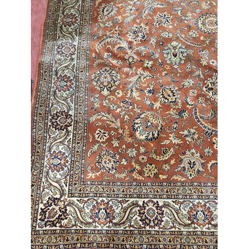 413 - A fabulous large Rust ground Wool Carpet with all over unique medallion design and multi borders.
L ... 