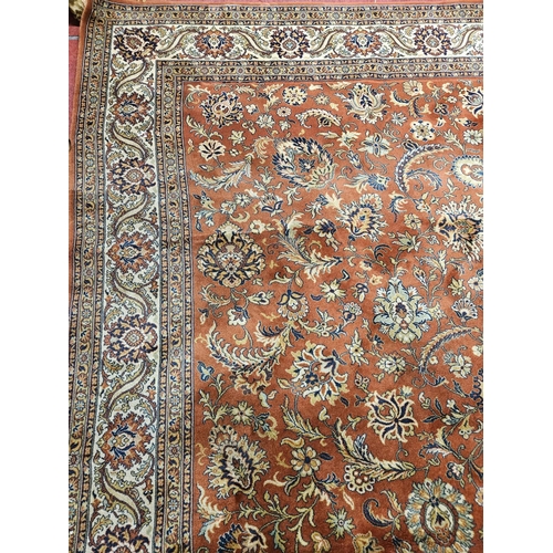 413 - A fabulous large Rust ground Wool Carpet with all over unique medallion design and multi borders.
L ... 