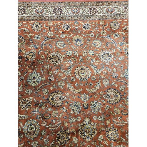 413 - A fabulous large Rust ground Wool Carpet with all over unique medallion design and multi borders.
L ... 