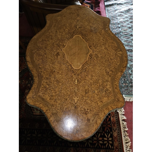 452 - A Magnificent 19th Century Walnut and Burr walnut centre Table with profusely inlaid top supporting ... 