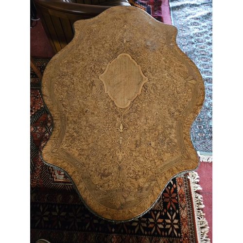 452 - A Magnificent 19th Century Walnut and Burr walnut centre Table with profusely inlaid top supporting ... 