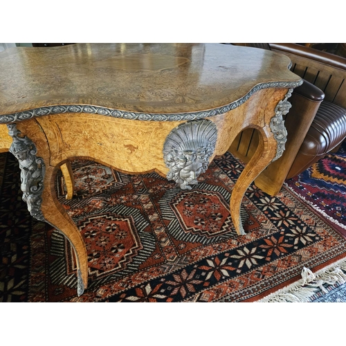 452 - A Magnificent 19th Century Walnut and Burr walnut centre Table with profusely inlaid top supporting ... 