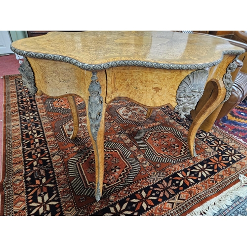 452 - A Magnificent 19th Century Walnut and Burr walnut centre Table with profusely inlaid top supporting ... 