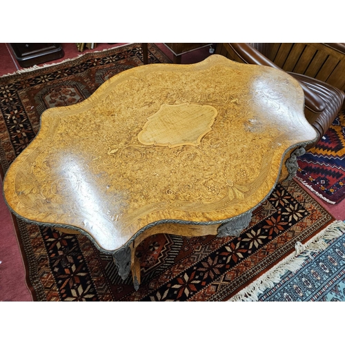 452 - A Magnificent 19th Century Walnut and Burr walnut centre Table with profusely inlaid top supporting ... 