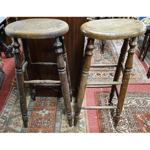 350 - Two 19th Century high bar Stools.