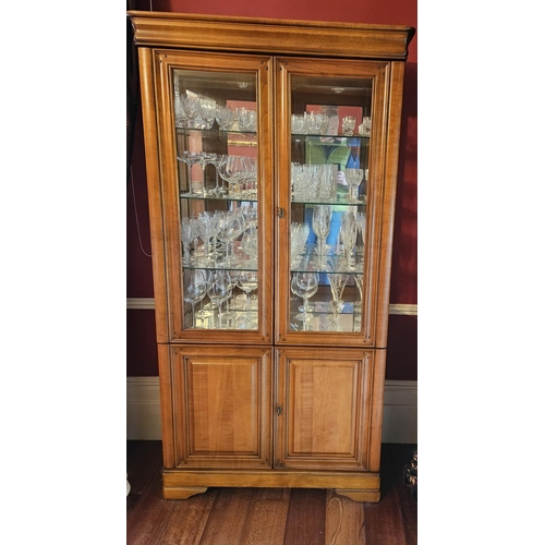 392 - A 20th Century Cherrywood glazed Display Cabinet. W 96 x d 38 x H 188 cm approx.