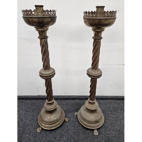 606 - A good pair of 19th Century Brass Candlesticks. H 69 cm approx.