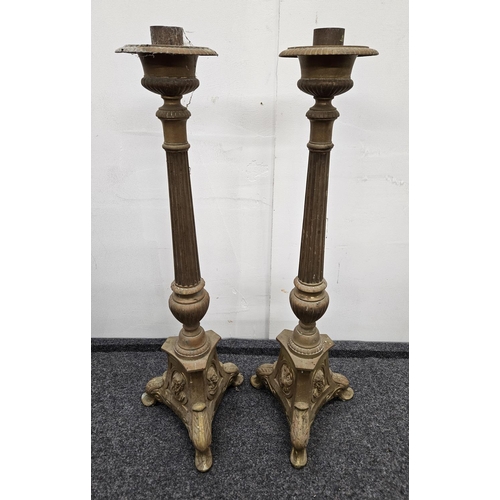 616 - A good pair of 19th Century Brass Candlesticks. H 67 cm approx.