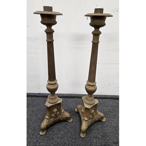 620 - A good pair of 19th Century Brass Candlesticks. H 67 cm approx.