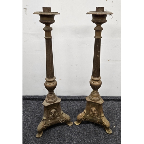 635 - A good pair of 19th Century Brass Candlesticks. H 66 cm approx.