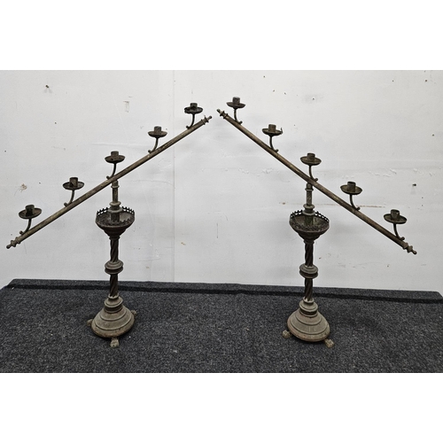 716 - A pair of 19th Century Brass Candelabra.