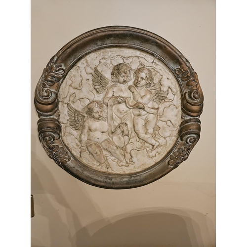 400 - A plaster circular Plaque along with a pair of early 20th Century oval Austrian wall Plaques