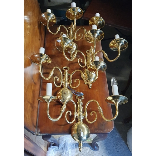 771 - A Set of four Brass Wall Lights, two of two branch and two of three branch. L 33 x W 45 cm approx.