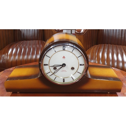 640 - A  Retro Mantel Clock. In working order according to the owner, Chimes on the hours ,with Key. H 25 ... 