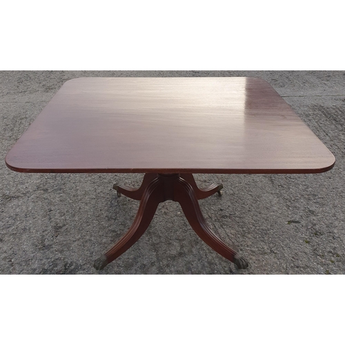 796 - A late 19th Century Mahogany Tilt top Breakfast Table on Brass caster Claw feet.