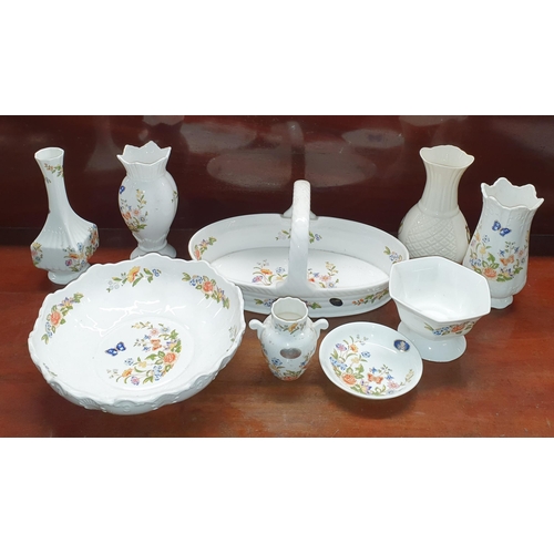 797 - A large quantity of Porcelain and Collectables to include examples of Aynsley, Belleek, Royal Albert... 