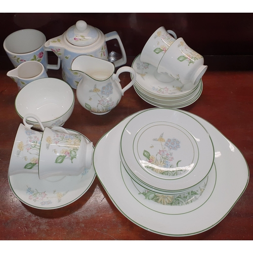 797 - A large quantity of Porcelain and Collectables to include examples of Aynsley, Belleek, Royal Albert... 