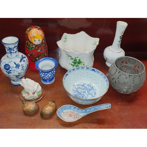 797 - A large quantity of Porcelain and Collectables to include examples of Aynsley, Belleek, Royal Albert... 