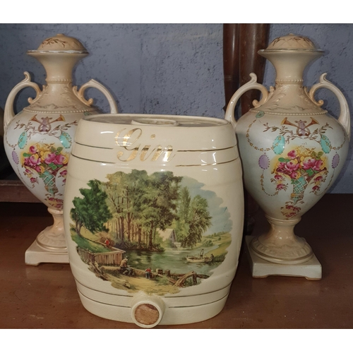 817 - A pair of Versaille's Phoenix Ware Urns along with Gin Jar.