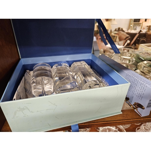 891 - A good quantity of Irish and other Crystal along with other decorative items. On two shelves.