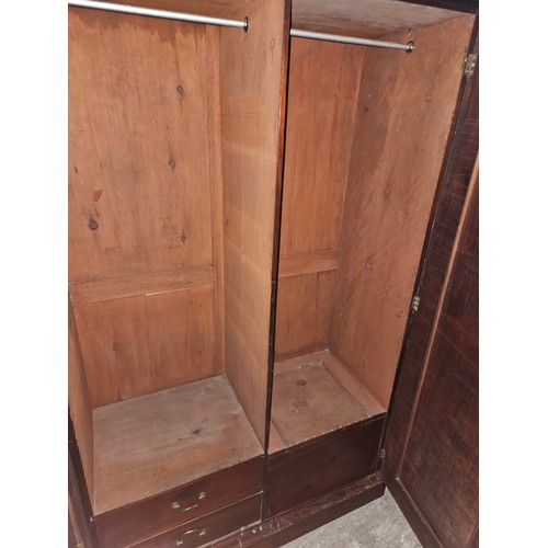 1113 - A 19th Century Mahogany two door Wardrobe with two interior drawers and shoe box.  H 205 x 130 x 60 ... 