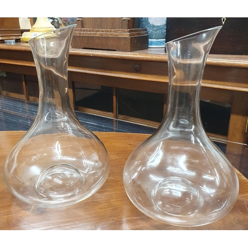 77 - A Pair of glass Wine Decanters / Water Carafes .