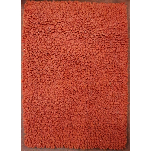 180 - A Red ground Rug.
95 x 66 cm approx.