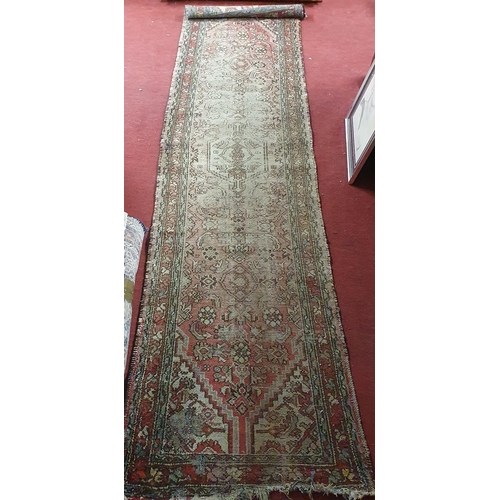 182 - A well worn Persian Runner .
270 x 65 cm approx.