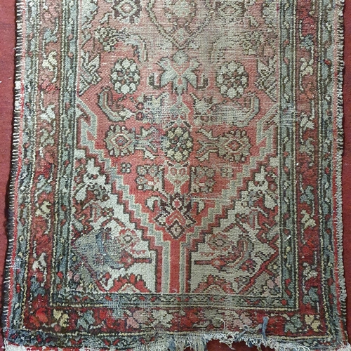 182 - A well worn Persian Runner .
270 x 65 cm approx.