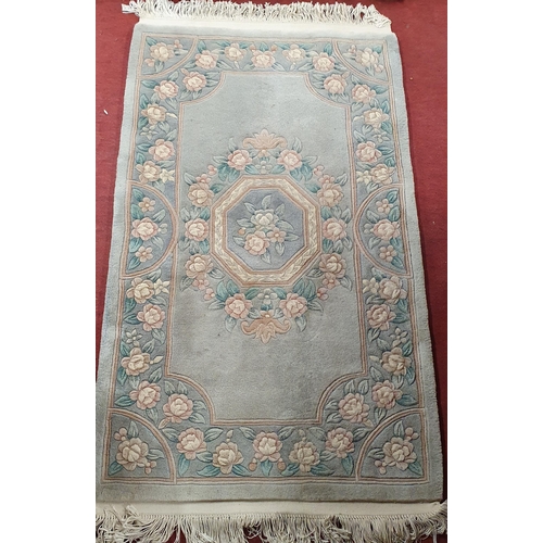 190 - A Good Oriental Style Grey/Blue ground Rug.
174 x 193 cm approx.