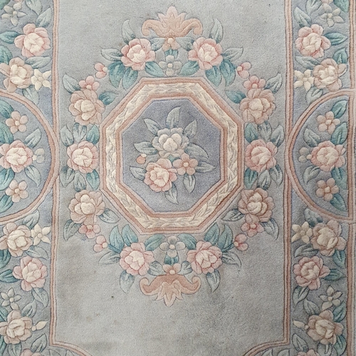 190 - A Good Oriental Style Grey/Blue ground Rug.
174 x 193 cm approx.