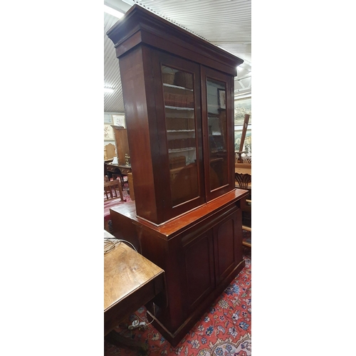 196 - A Victorian Mahogany 2 door Bookcase.
H 227 x 105 x 40 cm approx.