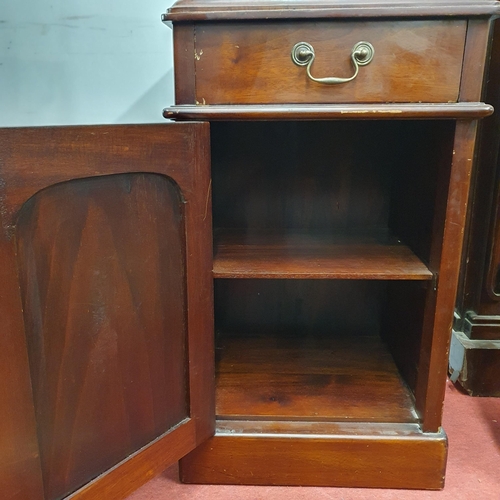 211 - A modern Mahogany Bedside Locker with single door and drawer frieze.
W 43  x D 37 x H 73 cm approx.