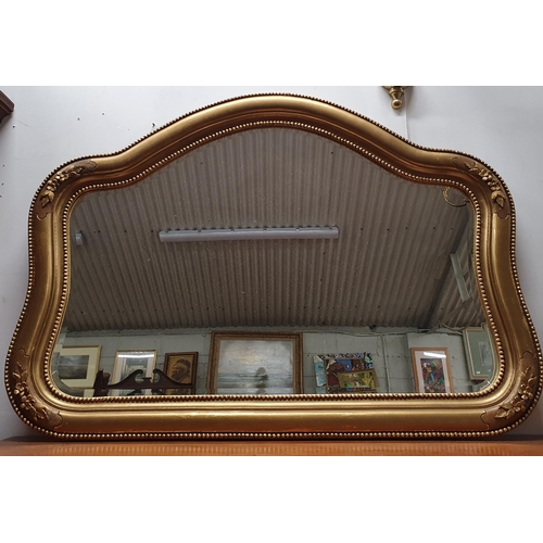 270 - A late 19th early 20th Century Timber Gilt Overmantel Mirror with bevelled glass.
Height 80 x W 110 ... 