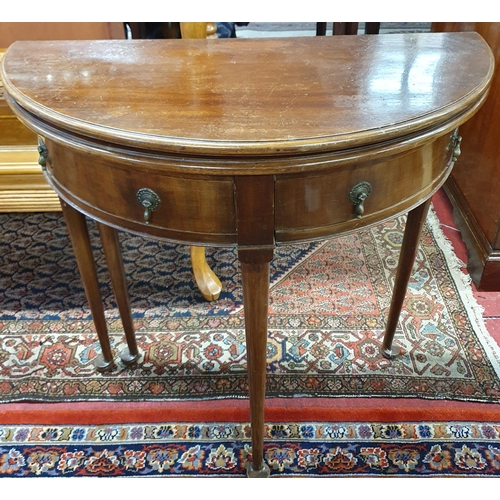 282 - An early 20th Century Mahogany foldover Card Table with turned pad feet. W77 x D38 x H72cm approx.