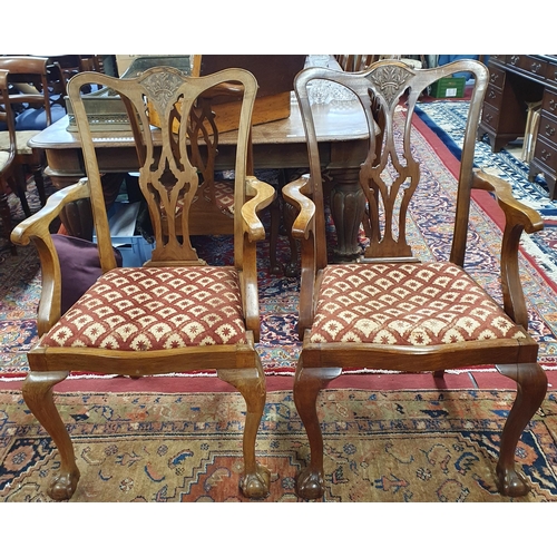 318 - A good pair of Early 20th Century Mahogany Carvers.