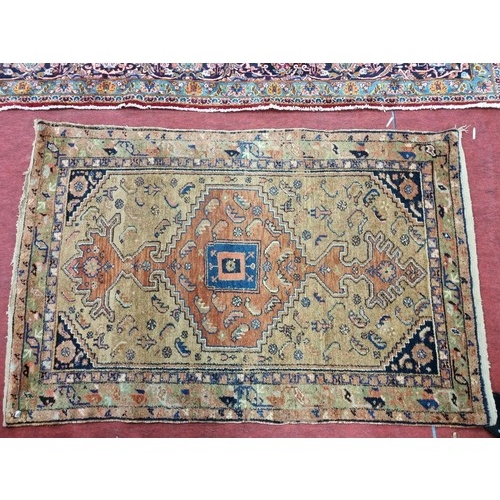 331 - A brown ground Rug with unique central decoration and multi borders. 190 x 130 cm approx.