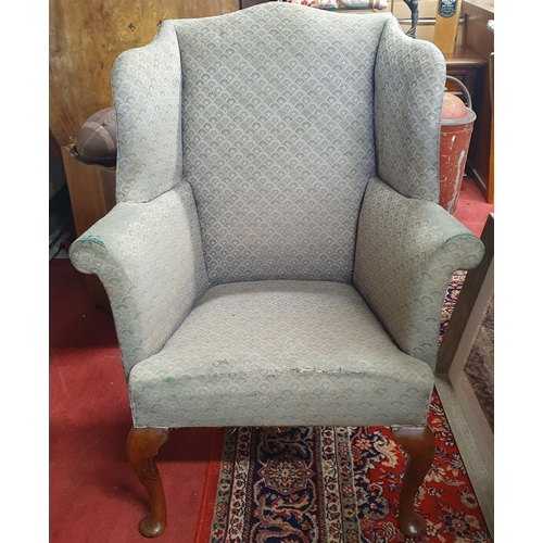 343 - A 19th Century Mahogany Wingback Chair of neat proportions with simple carved cabriole front support... 