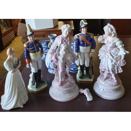 354 - A good quantity of Porcelain Figures and Vases to include Oriental examples. Tallest H 30 cm approx.