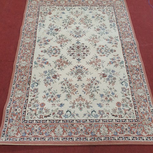 406 - A Salmon/Pink Rug with Cream tones .
L 170 x W 120 cm approx.