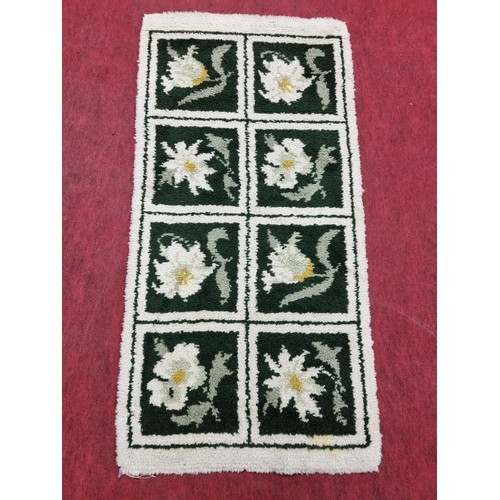 409 - Rectangular Cream and Green Wool Rug.
L 141 x W 70 cm approx.