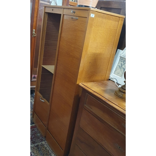 426 - An early to mid 20th Century Timber double fronted Filing Cabinet with tambour door front. W 84 x 40... 