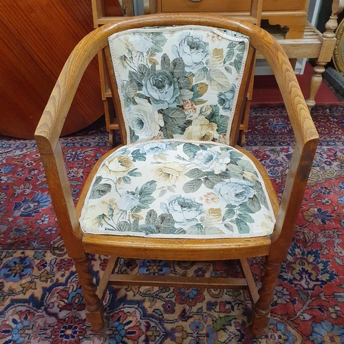 428 - An early 20th Century Oak Tub Chair with barley twist  supports and stretcher base. W 53 x SH 45 x B... 