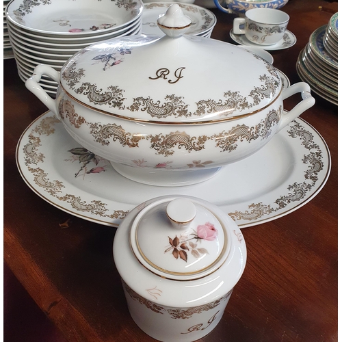 442 - A good quantity of Limoges Dinner Wares monogramed R.J with floral decoration.