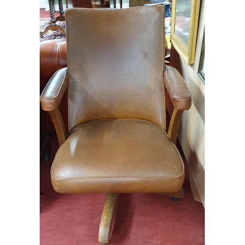 450 - An early 20th Century swivel office Chair with oak outline. W 54 x SH 40 x BH 90 cm approx.