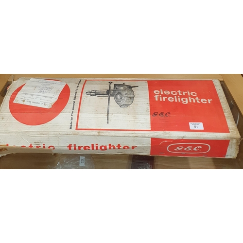 452 - A General Electric Firelighter in original box.
 L 65 cm approx.