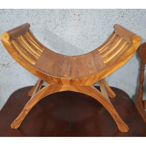 482 - An Arched Timber Seat.
H 54 x W 63 x D 35 cm approx.