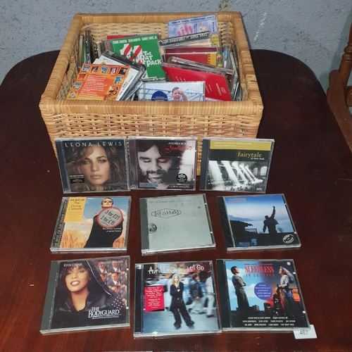 489 - A large quantity of CD'S in a wicker basket